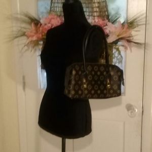 Brown zip and locks fashion bag